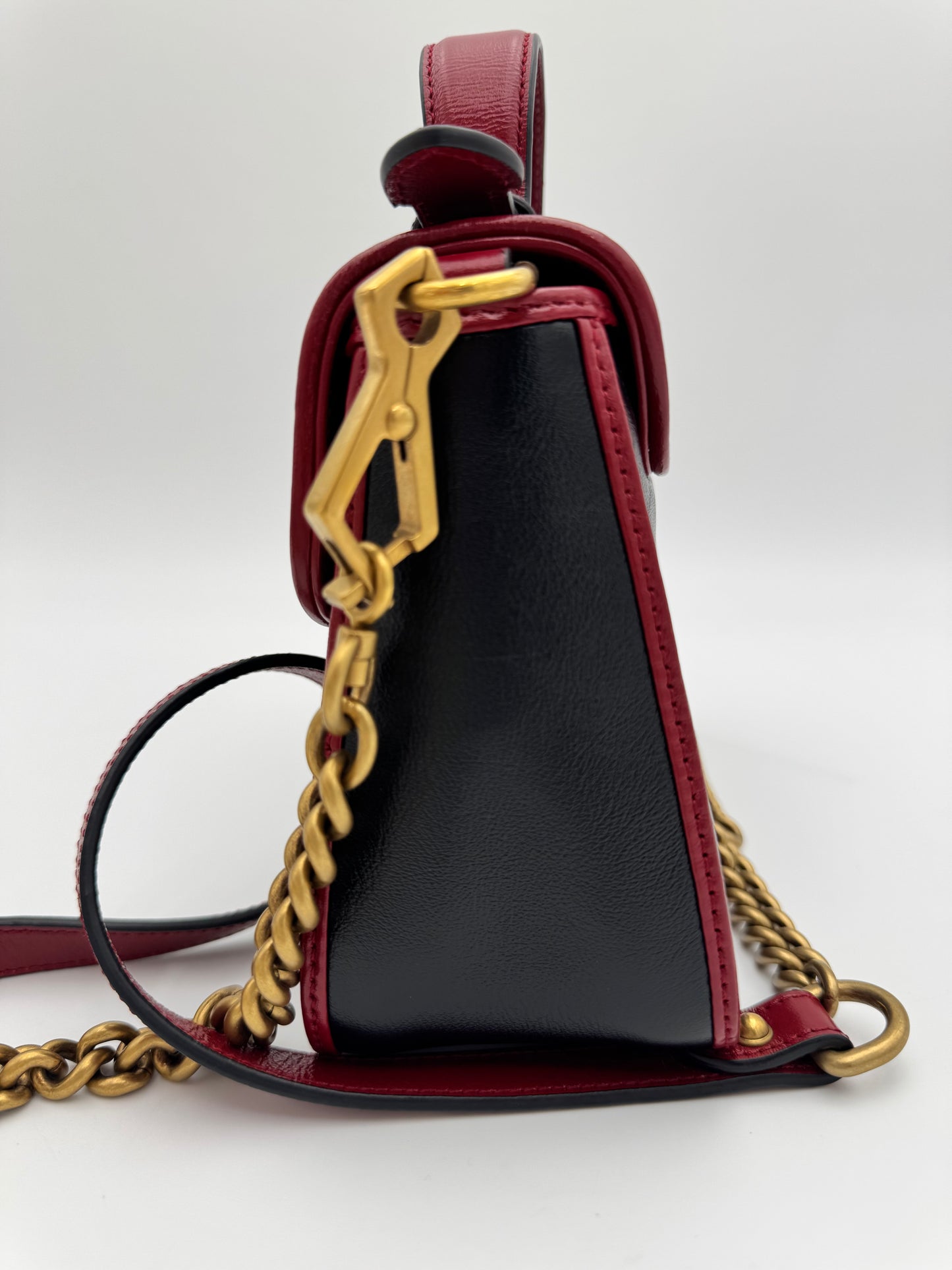 Gucci GG Marmont Torchon Mini Top Handle Bag - Black Quilted Leather with Cerise Red Trim