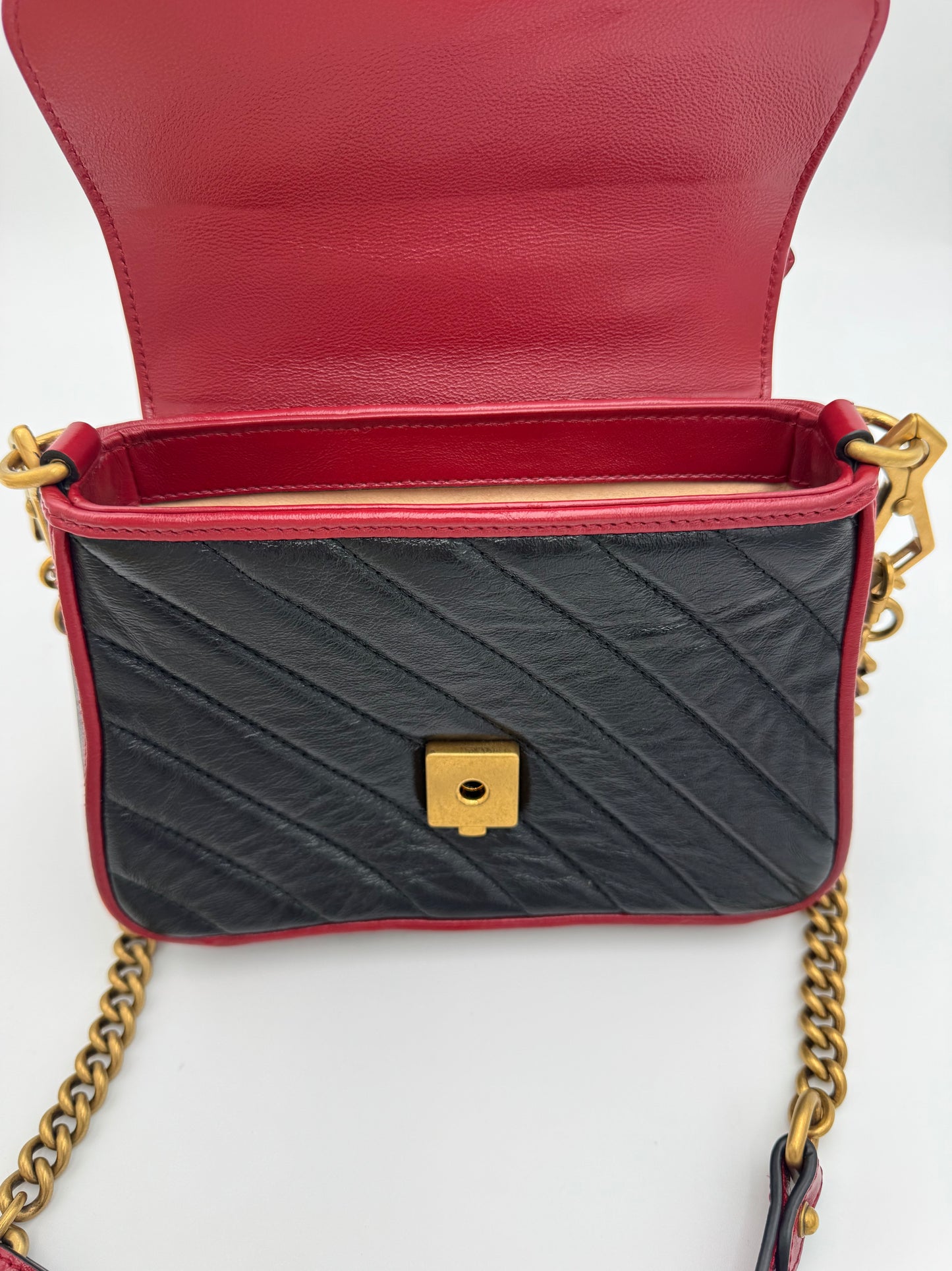 Gucci GG Marmont Torchon Mini Top Handle Bag - Black Quilted Leather with Cerise Red Trim